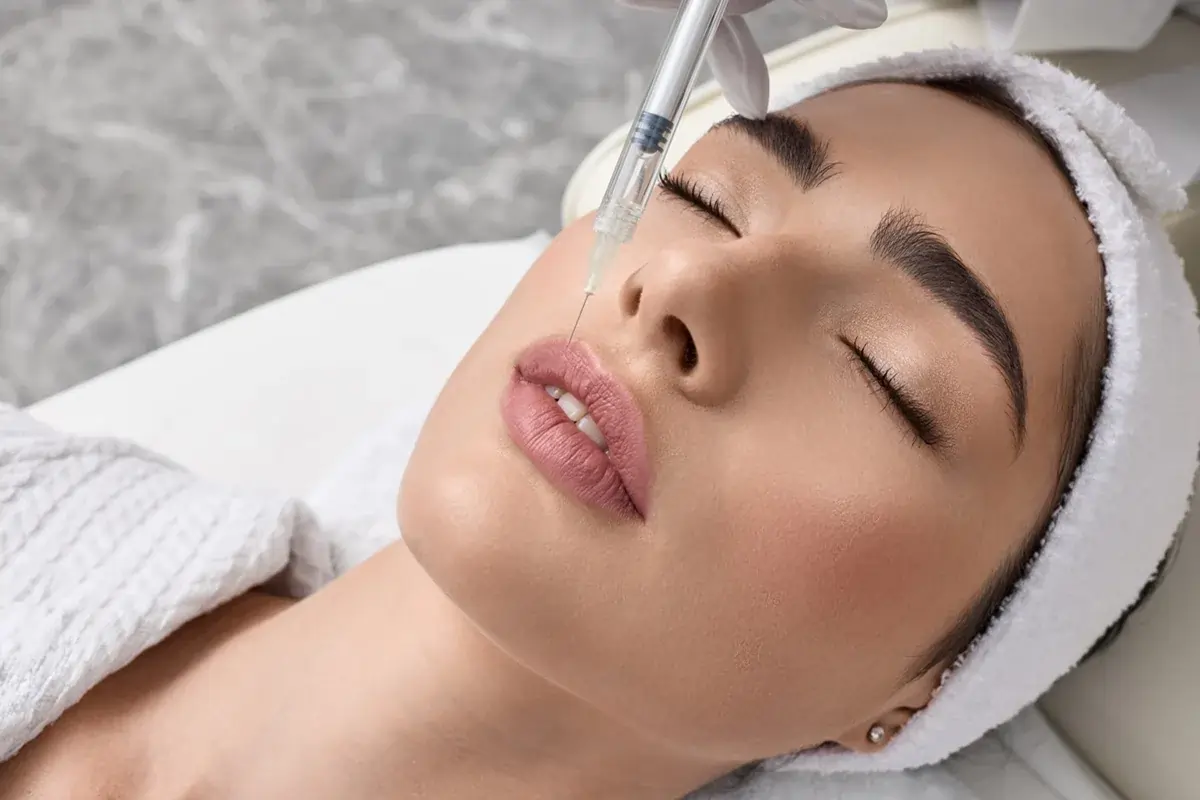 Expert injector treating lip asymmetry for a patient in Corte Madera, CA