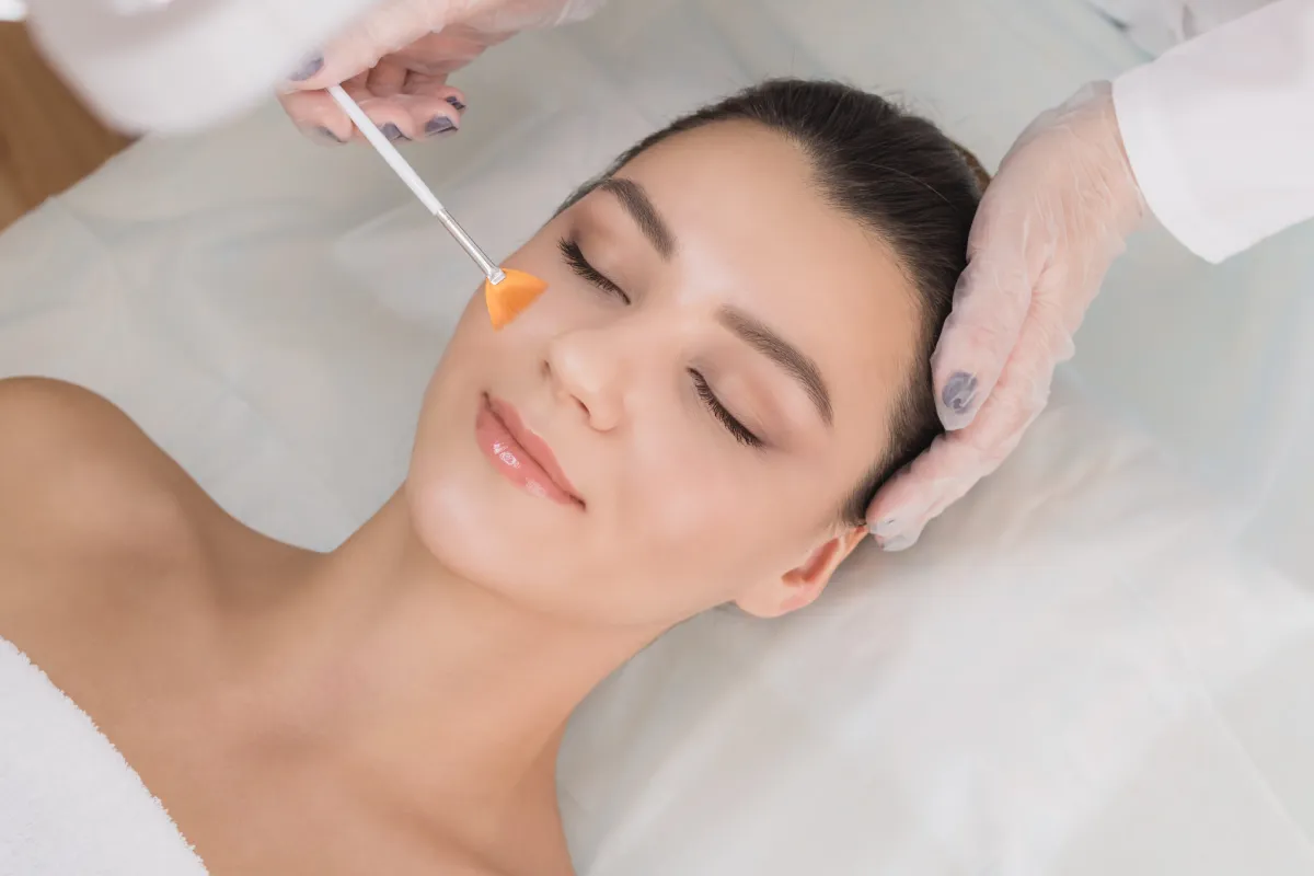 Woman receiving treatment for a clarifying chemical peel to target fine lines at Haus of Marin